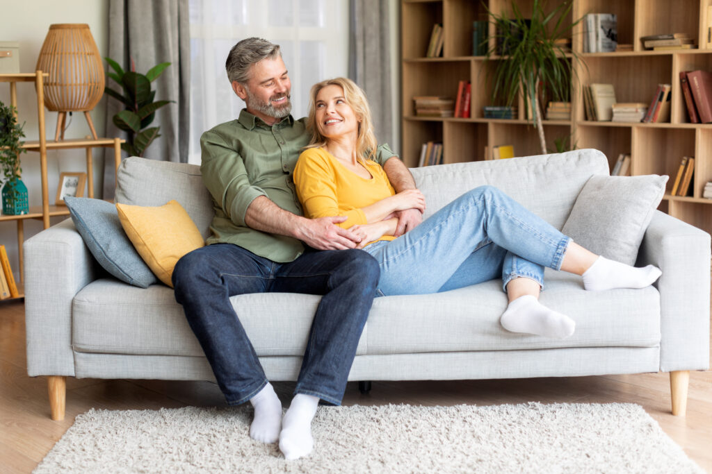 Couple on couch in Couples Therapy session